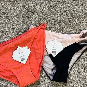YMI Swimwear in Coral, Pink, and Black